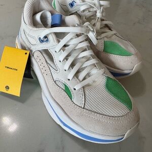 White and Green Sneakers with Blue Accents